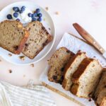 top down view of healthy banana bread sliced on a plate