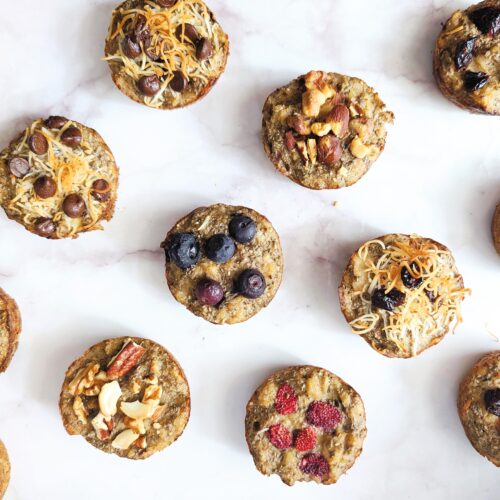 beauty shot of oatmeal muffins on a white marble surface