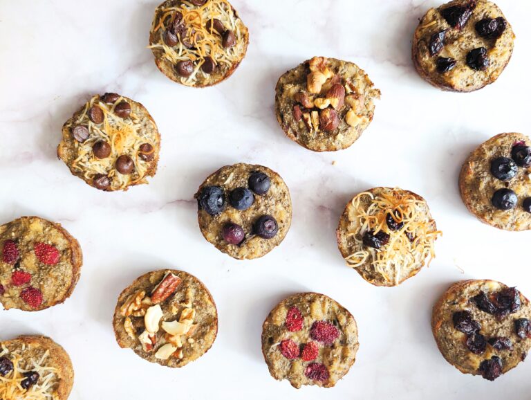 beauty shot of oatmeal muffins on a white marble surface