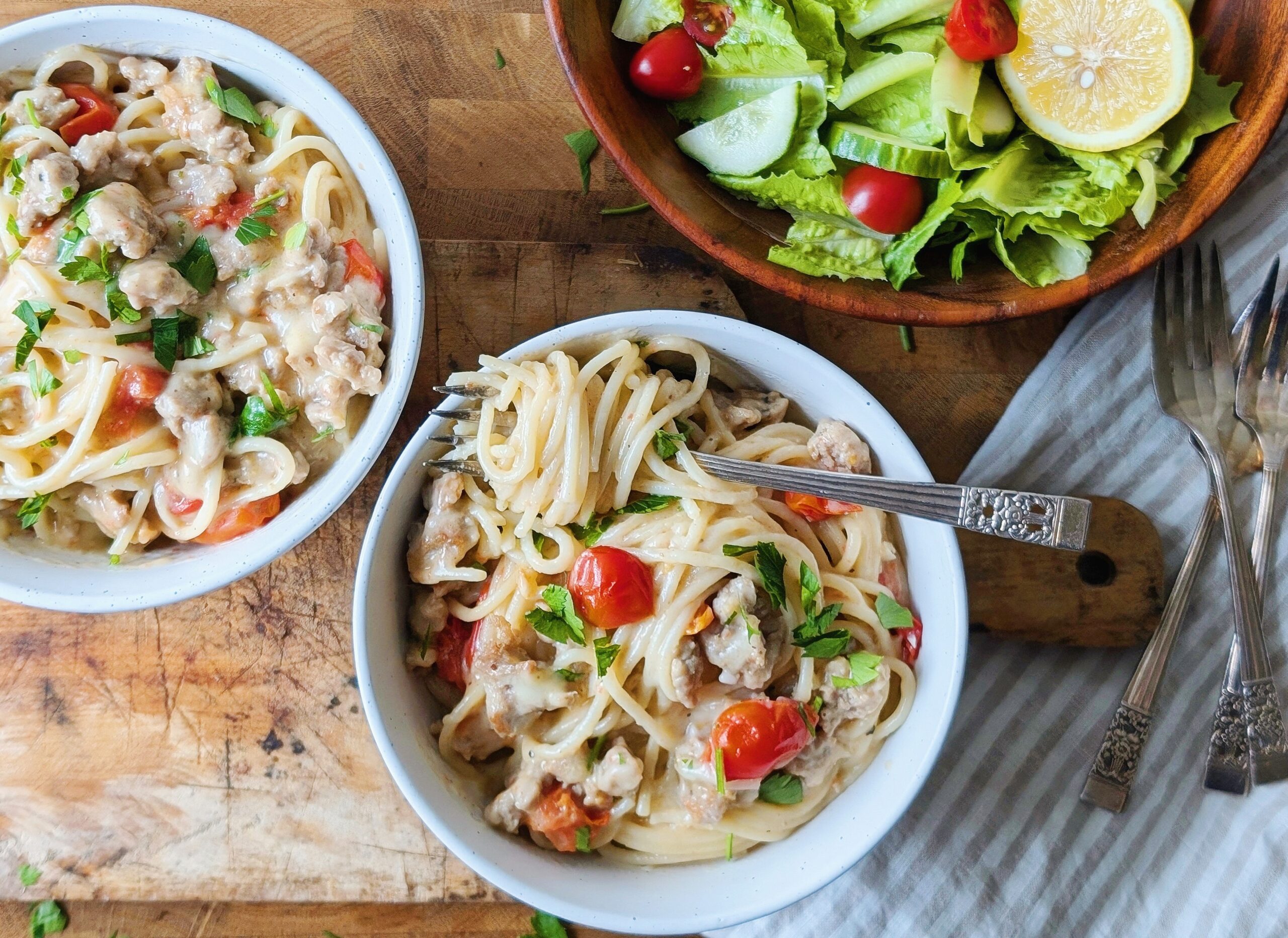 top down view of skillet pasta in bowls