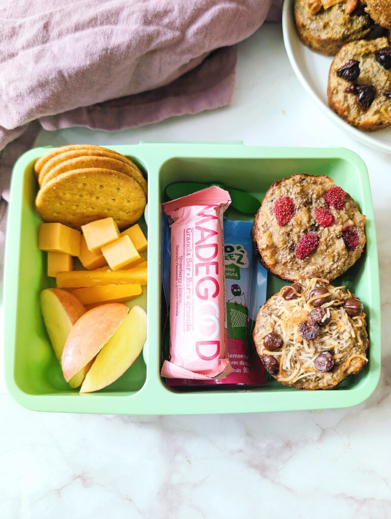 close up of a lunch box with oatmeal muffins