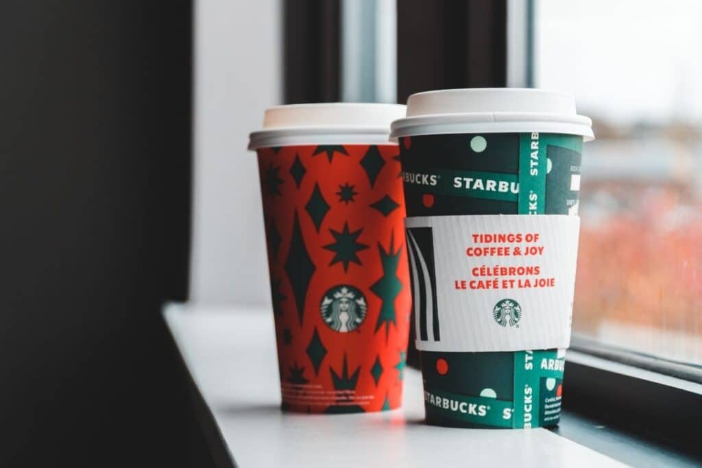 two holiday starbucks coffee cups