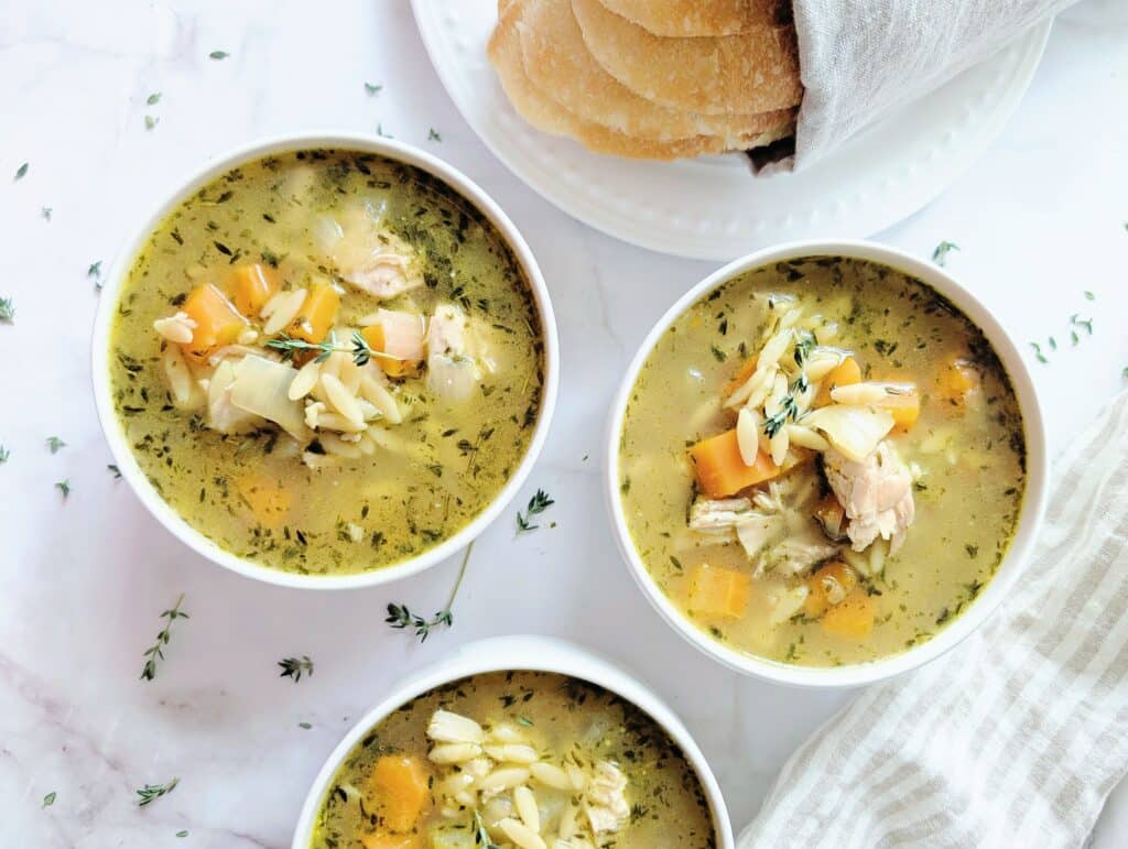 leftover turkey orzo soup top down in bowls