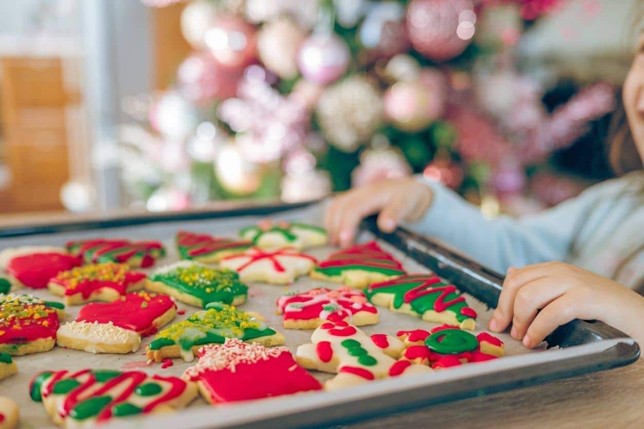 Strategies for Handling Holiday Treats with Kids - hanging around a plate of freshly baked cookies