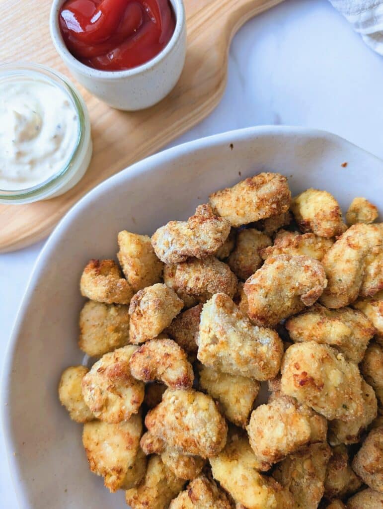 top down view of a big bowl of air fryer chicken nuggets