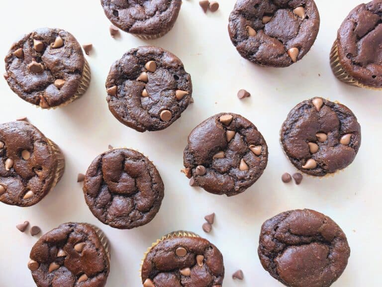 beauty shot of double chocolate veggie muffins top down view on a white platter