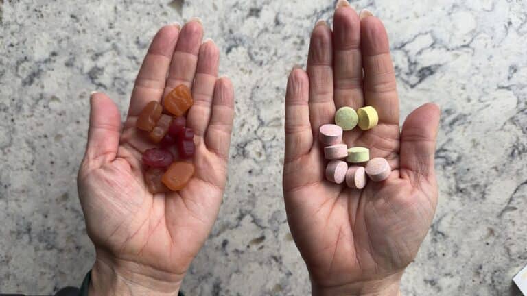 top down view of gummy and chewable vitamins side by side in hands