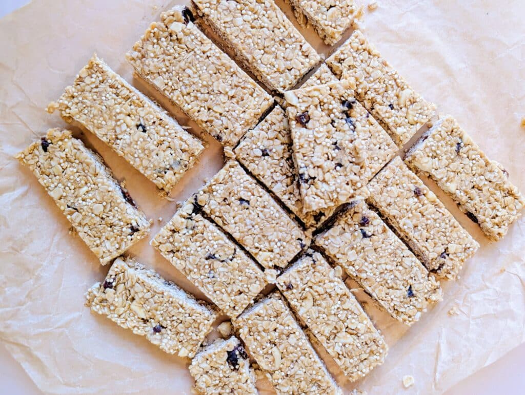 top down view of no-bake peanut butter oat bars on parchment paper