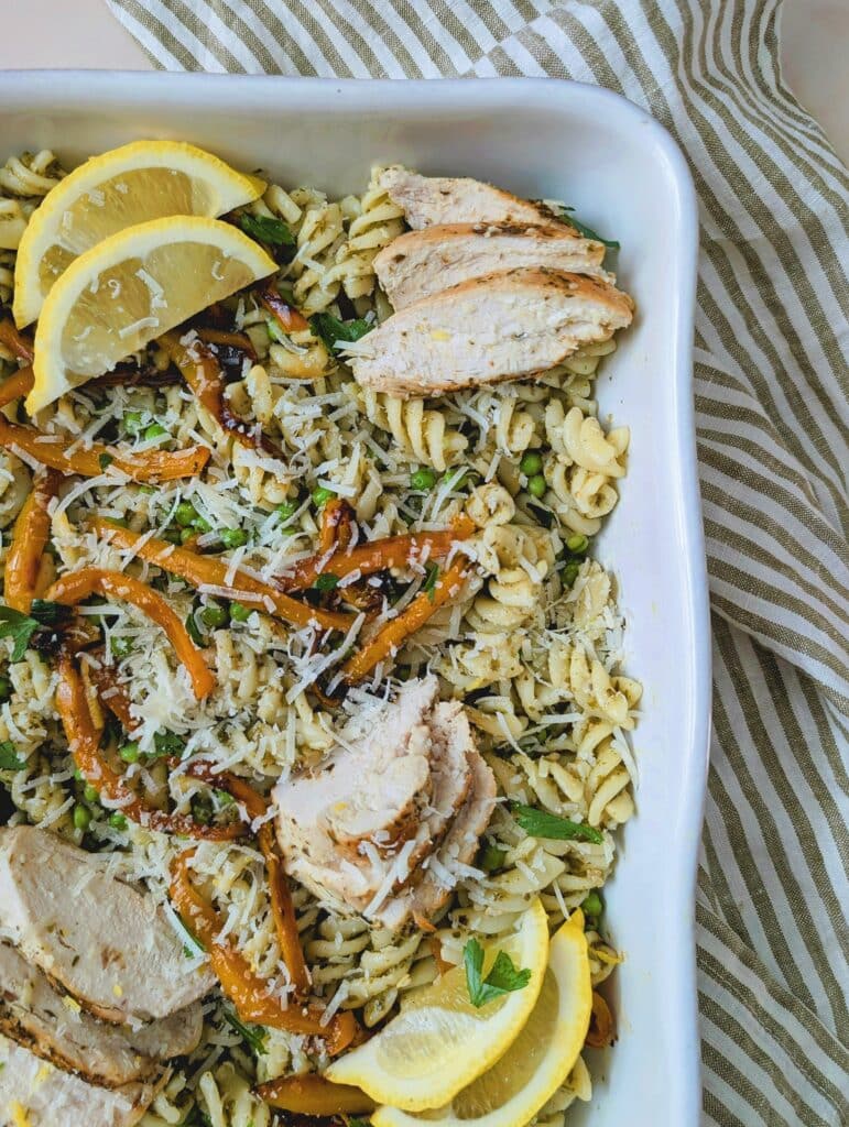big batch of chicken pesto pasta in a casserole dish