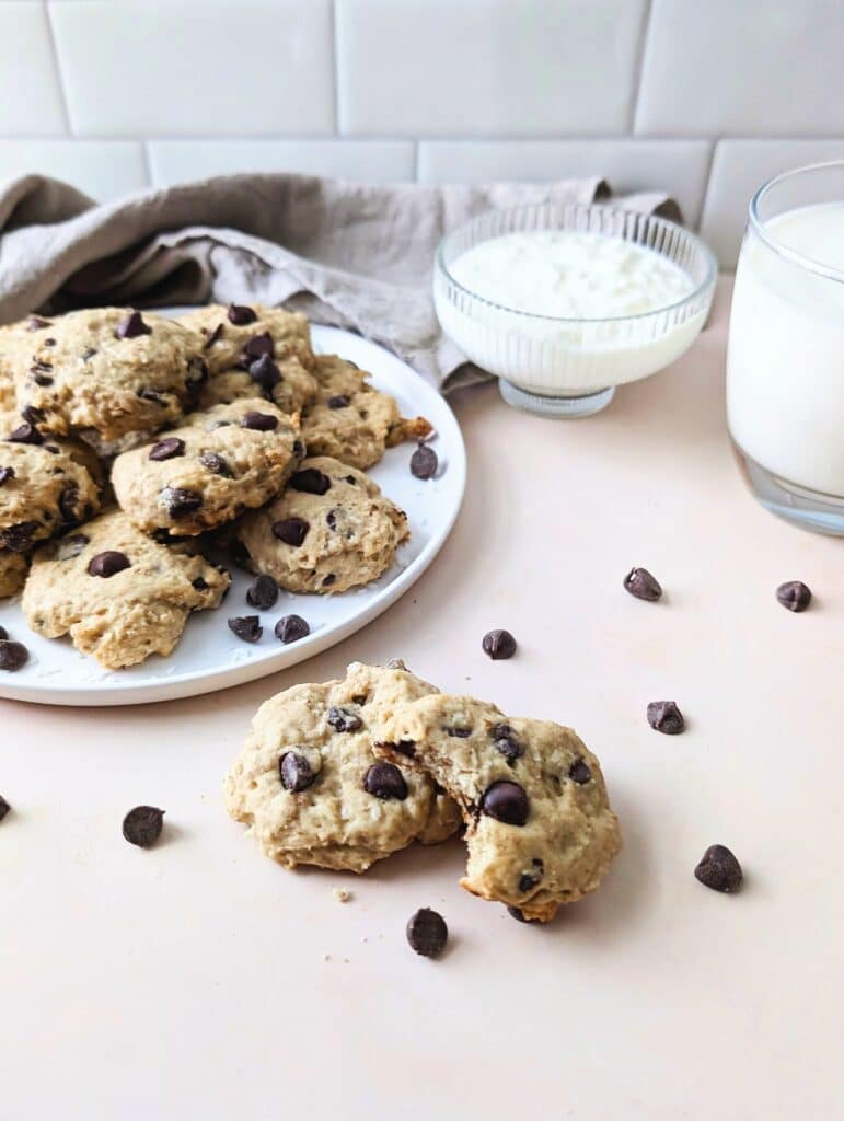 side view of a chocolate chip cookie with a bite taken out of it