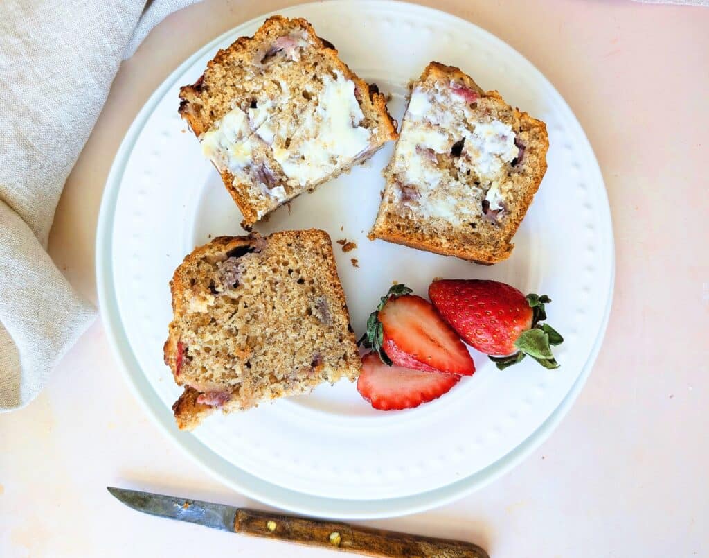 top down view of strawberry snacking loaf cut into smaller pieces for kids