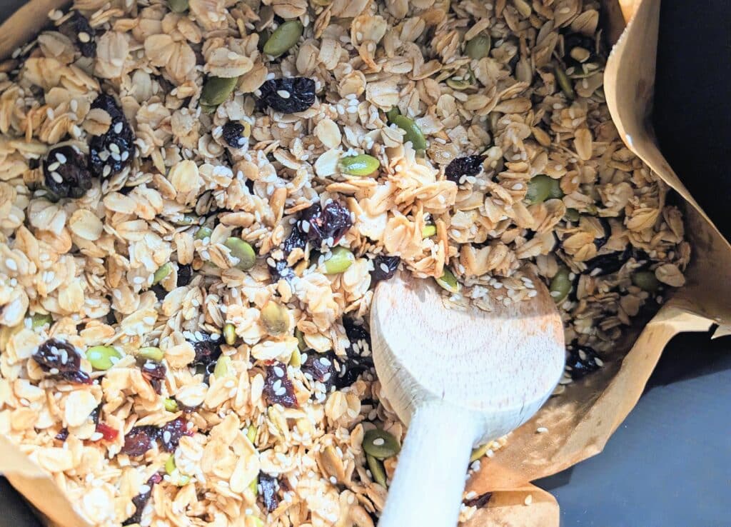 stirring in fruit to air fryer granola