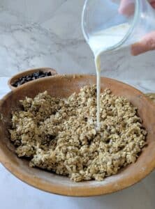 milk poured over top of oat mixture