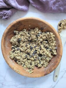 oats in a bowl with cherries mixed in