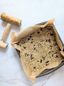 granola bar mixture pressed into a pan