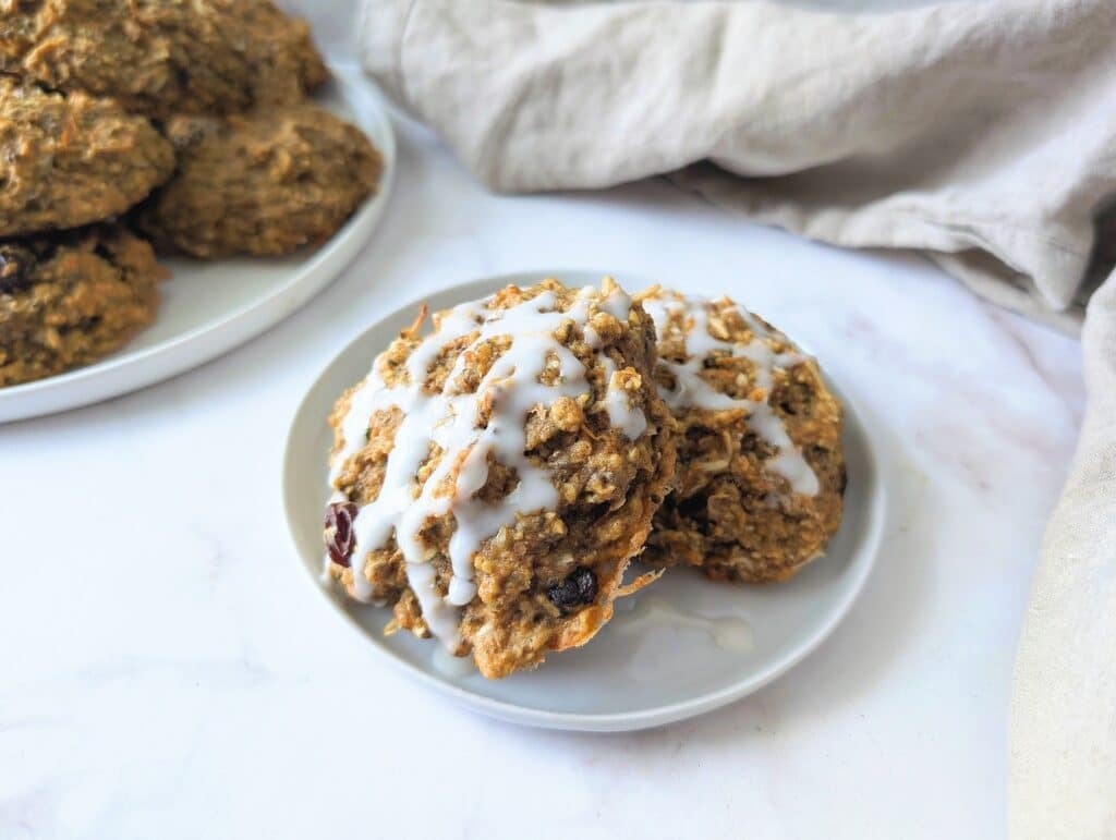 close up of carrot cake cookies with a drizzle