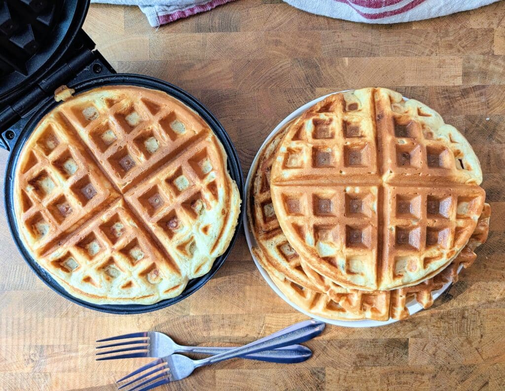waffles golden brown in a waffle maker