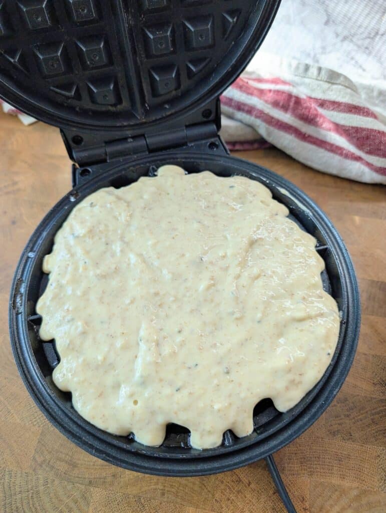 waffle batter in a waffle maker