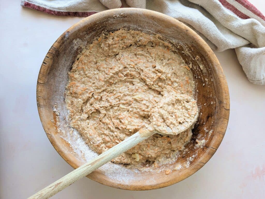 wet ingredients mixed together in large mixing bowl with dry ingredients